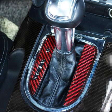 2 in 1 Carbon Fiber Gear Position Decorative Sticker for Ford Mustang 2015-2020 installed on red carbon fiber gear panel around automatic shifter