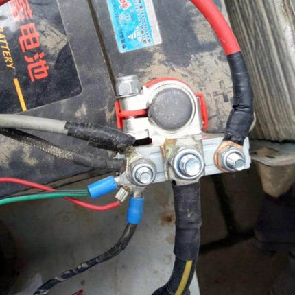 Foxsur Car Battery Terminal Clamp Kit For Wire Connectors installed on vehicle battery positive terminal with multiple auxiliary wires connected
