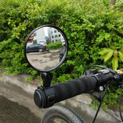 Universal Bicycle Rearview Mirror 360 Degree Rotating mounted on bike handlebar showing clear rear view for safer city commuting