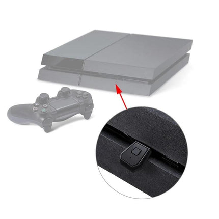 Bluetooth Adapter for Easy PS4 Gaming Chats at Home plugged into PS4 USB port next to controller for wireless headset pairing