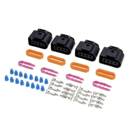 Ignition Connector Repair Kit for Everyday Vehicle Maintenance showing four black connectors and wiring terminals for DIY engine repairs