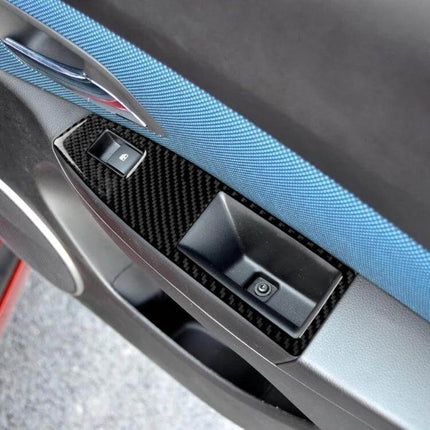 Carbon Fiber Decorative Sticker for Chevrolet Cruze Right Switch installed on door panel near window controls