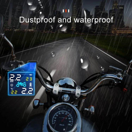 Universal Wireless Solar-Powered Motorcycle Tire Pressure Monitor mounted on motorcycle handlebars showing waterproof dustproof display in heavy rain
