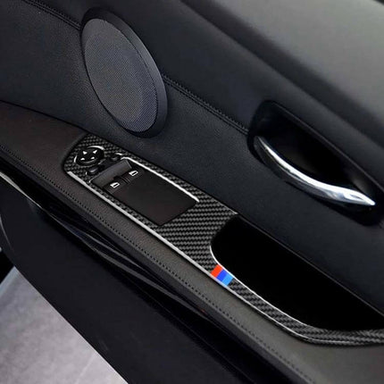 Right Side Carbon Fiber Decorative Sticker for BMW Cars applied to interior door panel near window controls and handle