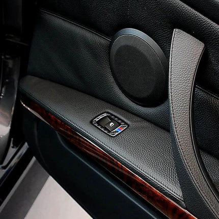Right Side Carbon Fiber Decorative Sticker for BMW Cars applied on interior door panel near speaker and window switch