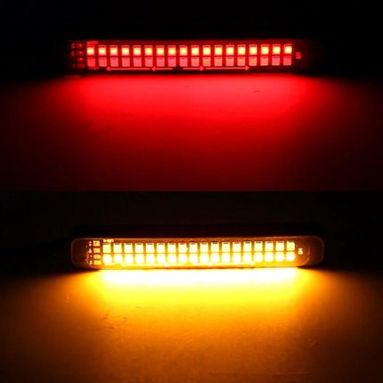 Dynamic Flowing Water Effect Motorcycle LED Turn Signal Light, 105mm - amber and red flowing LED turn signal illuminated in dark