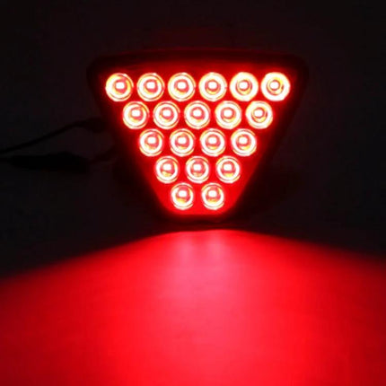Car Triangle LED Light For Brake And Reversing Use - compact 12V triangular LED brake and reverse signal light glowing red on dark background