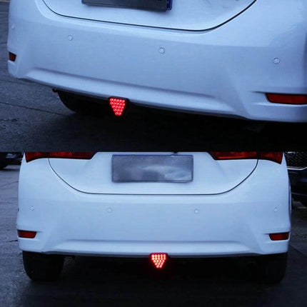 Car Triangle LED Light For Brake And Reversing Use mounted on rear bumper showing bright red triangular LED brake and reversing signal for low-light visibility