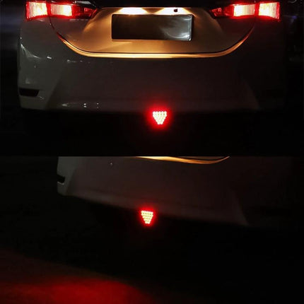 Car Triangle LED Light For Brake And Reversing Use mounted on rear bumper showing bright red triangular LED brake and reversing signal at night