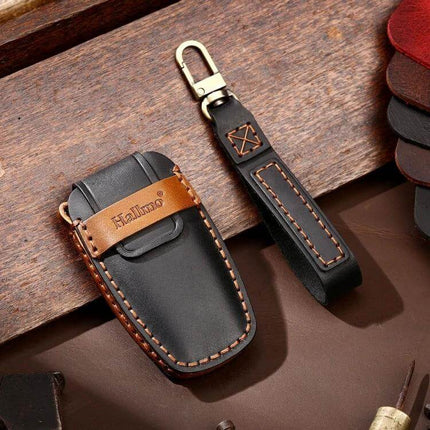 Hallmo Cowhide Leather Key Cover for Haval H6 Car Keys shown in black and brown genuine cowhide protecting a Haval H6 key fob with detachable strap