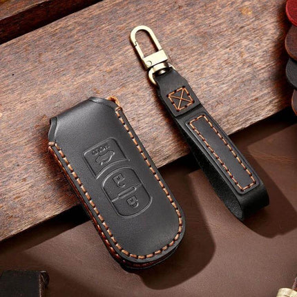 Hallmo Leather Protective Key Cover for Mazda Axela 3-Button in black cowhide with contrast stitching and keyring strap
