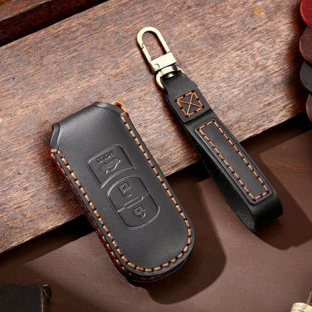 Hallmo Leather Protective Key Cover for Mazda Axela 3-Button in black cowhide with contrast stitching and keyring strap