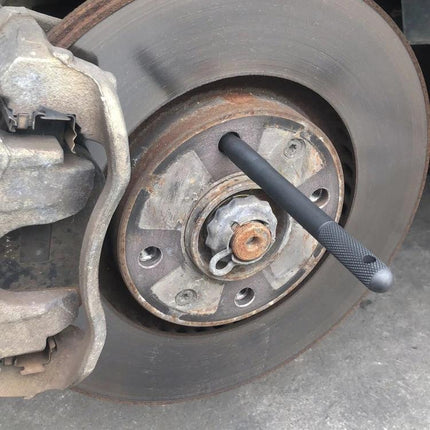 ZK-113 Pin Aids Wheel Alignment During Car Maintenance - knurled pin guide aligning lug holes to hub for easier tire changes