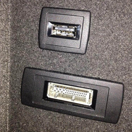Car AMI AUX Audio Cable For Mercedes-Benz AMI System showing earphone jack and 8PIN AMI connector installed in vehicle console