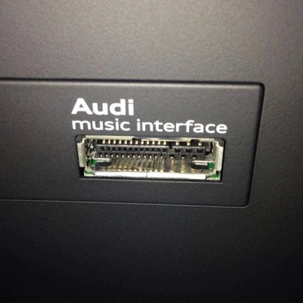 Car AMI Aux Cable For Audi Plug And Play Music From Phone shown with Audi music interface AMI port for phone audio playback
