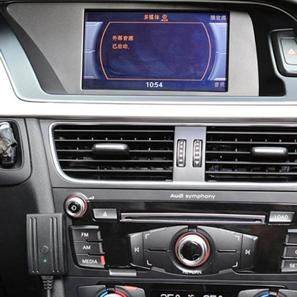 Car Six Disc CD Player With AUX Bluetooth And Mic For Audi installed in Audi dashboard showing display, controls and Bluetooth module