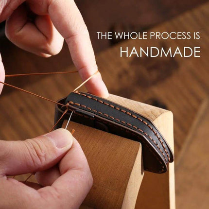 Hallmo Cowhide Leather Key Case for Hyundai 7-Button Keys handcrafted black leather with contrast stitching being stitched by hand