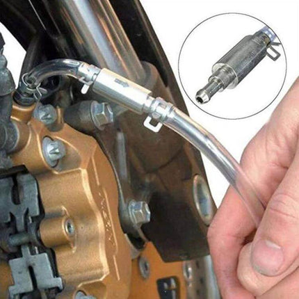 Motorcycle Hydraulic Brake Bleeder Tool Set of 2 Pieces connected to motorcycle brake caliper for bleeding air and old fluid