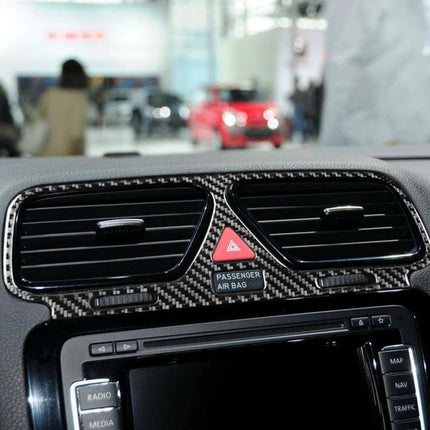 Carbon Fiber Decorative Sticker for Volkswagen Scirocco Air Outlet shown installed on dashboard air vents with carbon fiber finish