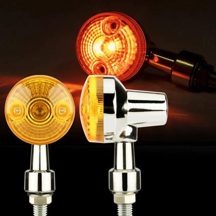 Motorcycle Turn Signal Lights, Set of 2 for Night Visibility - chrome housings with amber G4 halogen bulbs glowing for improved night signaling