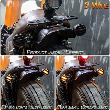 Motorcycle Turn Signal Lights with Metal Housing, 2-Pack installed on rear fender showing bright halogen turn signal illumination