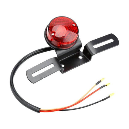 Retro Round Motorcycle Brake Light with License Plate Holder mounted on black bracket with wiring, red retro round tail/brake light for improved rear visibility