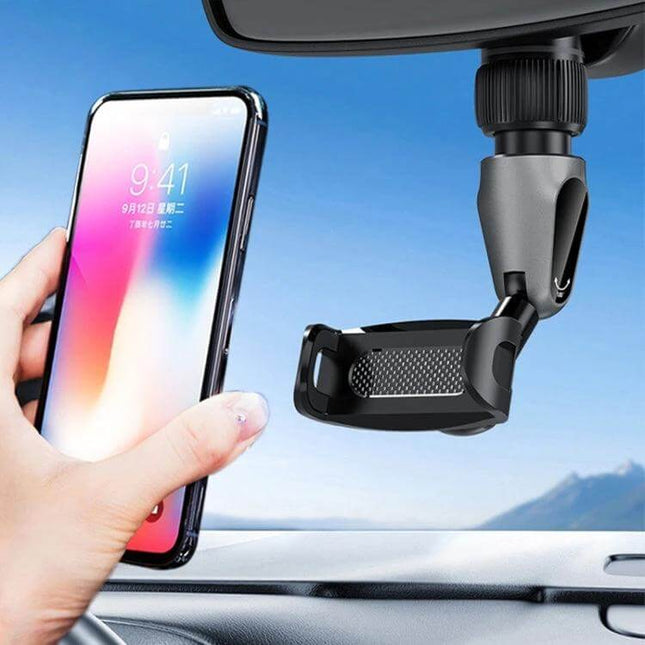 Car Mobile Phone Holder with 360-Degree Rotation Clamp mounted on rearview mirror holding smartphone for hands-free navigation and calls