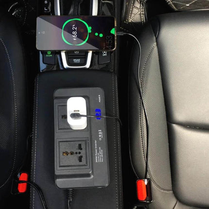 Smart Car Power Inverter with Digital Voltage Display and EU Plug powering phone and charger on a car center console