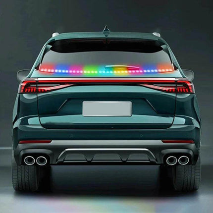 Car RGB LED Rear Light Strip For Safe Daytime Driving installed on SUV rear bumper showing multicolor daytime visibility and signaling patterns