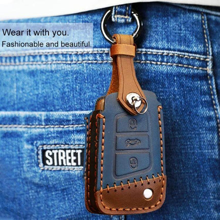 Cowhide Leather Protective Key Case for Volkswagen Cars hanging from jeans keyring, brown stitched cowhide cover protecting VW key fob