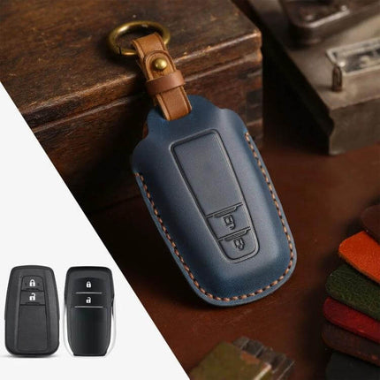 Cowhide Leather Key Protective Cover for Toyota Cars in blue genuine cowhide with stitched trim and keyring, ideal for Camry key fobs