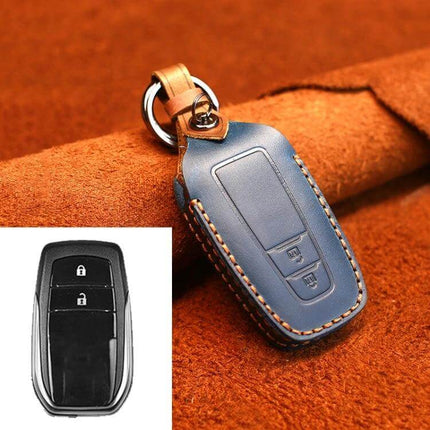 Cowhide Leather Key Protector for Toyota Cars, Two-Key Version - blue genuine cowhide leather key cover on brown suede background