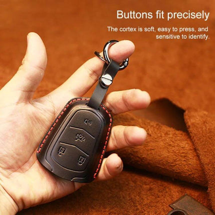 Cowhide Leather Key Case for Cadillac Cars, Five Keys Version - hand holding brown cowhide leather key case with red stitching and key ring