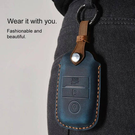 Cowhide Leather Protective Key Cover for Kia Vehicles shown in blue leather key fob case attached to belt loop