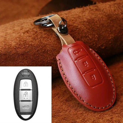 Protective Cowhide Leather Key Case for Nissan Qashqai Tiida in red genuine leather with keyring, protects buttons from scratches and dirt
