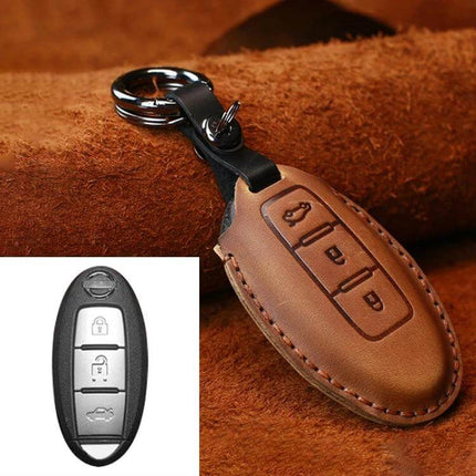 Protective Cowhide Leather Key Case for Nissan Qashqai Tiida leather key fob cover protecting buttons and edges, brown stitched design