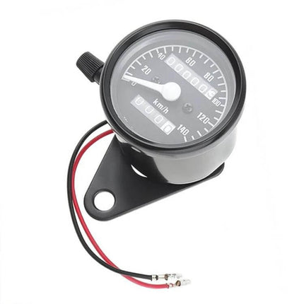 Retro Style Motorcycle Speedometer for Daily Rides in Black - compact metal speedometer with black bezel, km/h dial and wiring for commuting bikes
