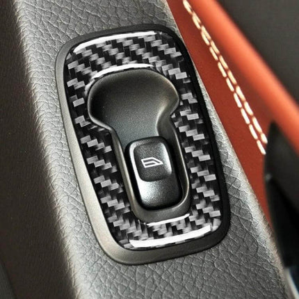Carbon Fiber 4-in-1 Door Sticker for Volvo XC90 Right Drive installed on right-drive window switch trim showing carbon fiber pattern and textured interior contrast