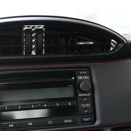 Carbon Fiber Decorative Sticker for Subaru BRZ and Toyota 86 2017-2019 installed on dashboard air vent trim showing carbon fiber pattern and red stitching