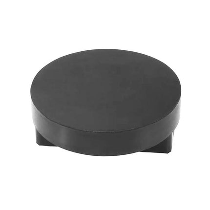 Rubber Blocks for Lifting Your BMW During Routine Maintenance - black round rubber jack pad protecting chassis during oil change and tire rotation