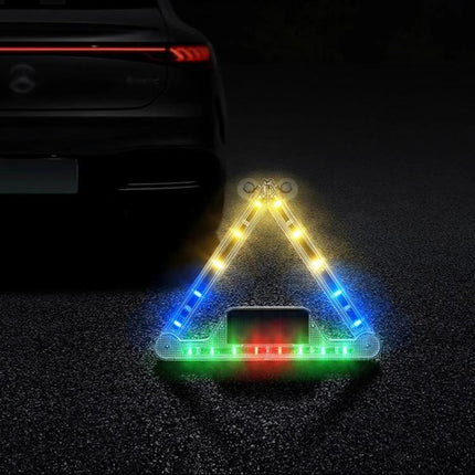 Car Triangular Warning Light With Solar Charging For Roadside Use showing illuminated multicolor LED triangle on asphalt near a parked car at night
