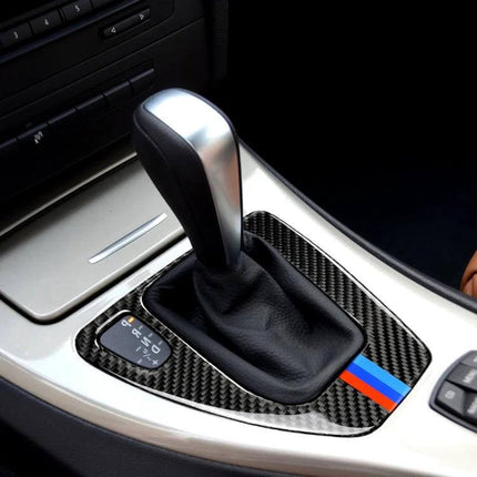 Carbon Fiber Sticker for Left-Hand Drive Car Interior in Three Colors installed around automatic gear shift showcasing textured carbon finish and colored stripe