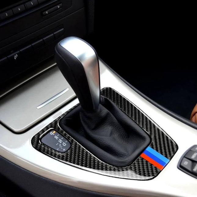 Carbon Fiber Sticker for Left-Hand Drive Car Interior in Three Colors installed around automatic gear shift showcasing textured carbon finish and colored stripe