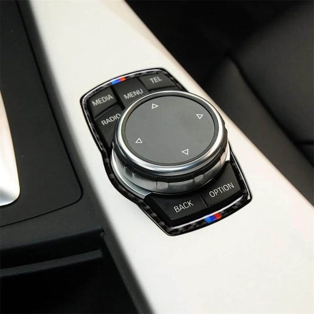Carbon Fiber Three-Color Decorative Sticker for BMW Cars applied around BMW iDrive controller, subtle carbon fiber trim with blue-red stripe accents