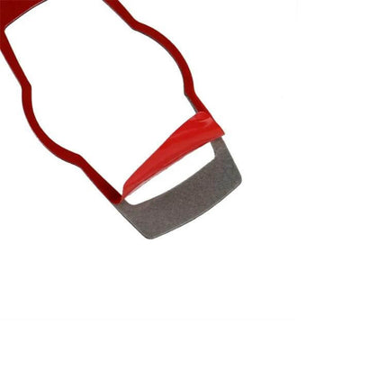 BMW Carbon Fiber Headlight Switch Decorative Sticker applied to headlight switch with red backing film for easy installation