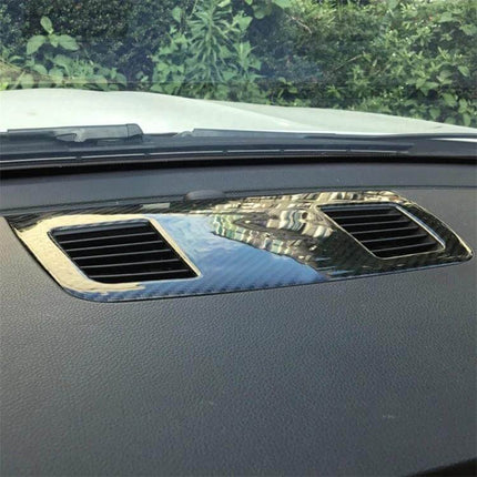 Carbon Fiber Decorative Sticker for BMW Instrument Panels on dashboard vent trim, glossy carbon fiber finish enhancing interior