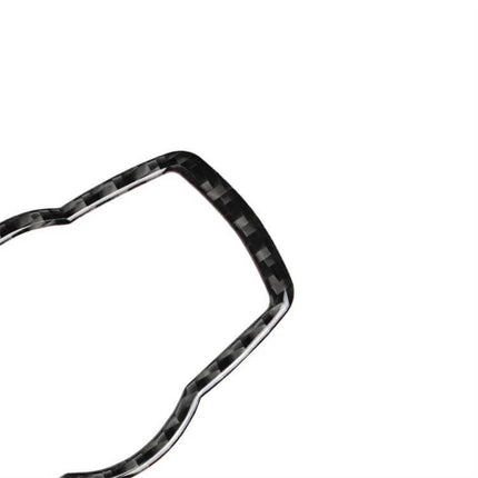 Carbon Fiber Decorative Sticker for BMW Headlight Switches - close-up carbon fiber trim piece for dashboard headlight control