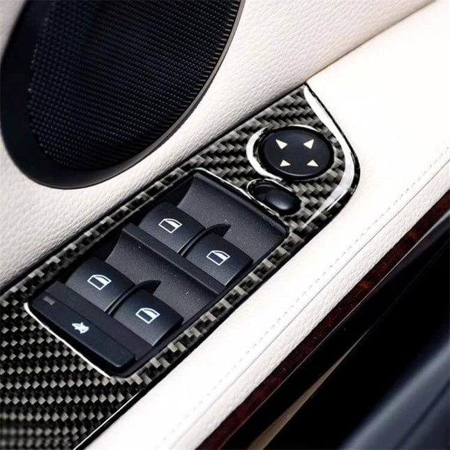 Carbon Fiber Decorative Stickers for Car Panels, 4 Pieces, Three Colors applied to white car door panel around window controls, close-up carbon fiber trim