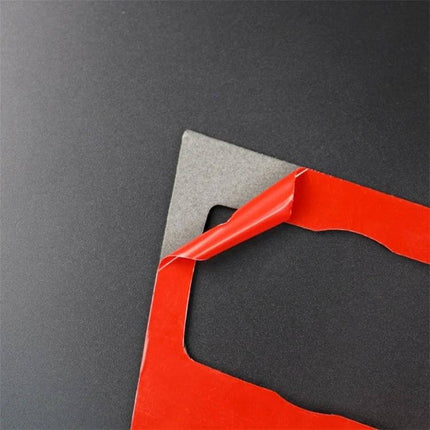 Carbon Fiber Decorative Sticker for Car Interior Panel – red adhesive backing peeled on trim piece for BMW E90 E92 CD panel