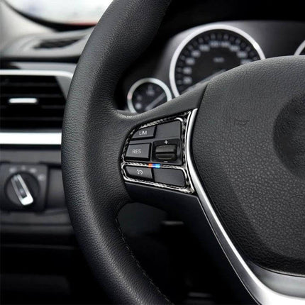 Carbon Fiber Decorative Sticker for BMW Steering Wheels on black leather BMW steering wheel close-up, modern subtle interior trim